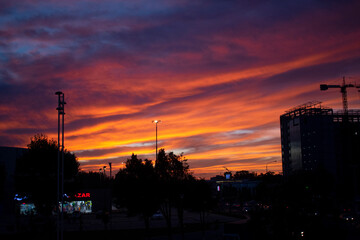 Naklejka premium sunset over the city