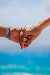 Wedding couple hands are taking each other