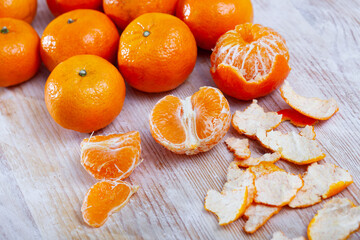 Ripe clementines on wooden table. High quality photo