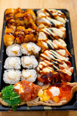 angle view fresh sushi on a plate vertical composition