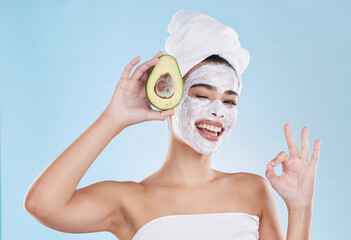 Skincare, beauty and ok sign for avocado face mask with beautiful woman taking care of healthy skin. Organic, fresh and cleansing facial with routine treatment and natural ingredient for good results