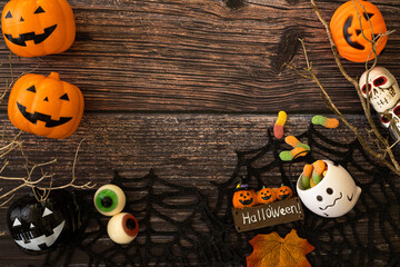 Decorate your Halloween home with a bucket of candy for a trick or treat.