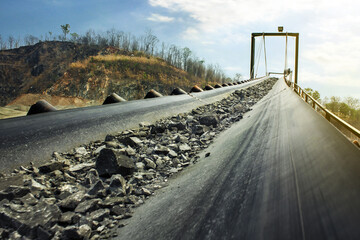 Industrial mining handling belt conveyor moving raw materials