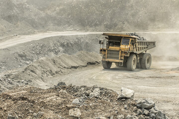 Big mining dumping truck in miner site
