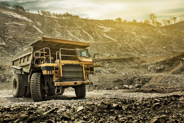 Big mining dumping truck in miner site