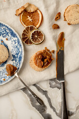 Messy flat lay of caramel filled cookies 