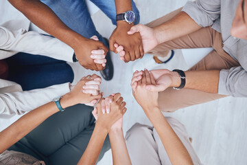 Support, prayer and trust with hands of people praying in spiritual faith and comfort in a meeting...