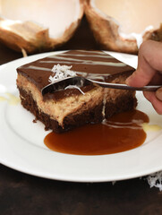 Bounty Cake made of fresh coconut on a table