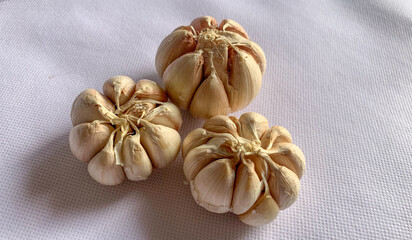Garlic on a white background. a versatile food ingredient used in many cooked