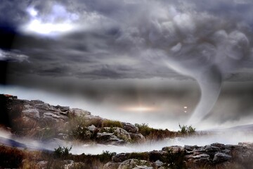 Stormy sky with tornado over landscape