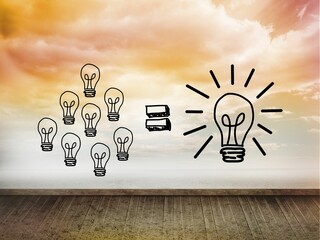 Light bulbs on wall with bright sky