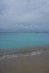Waikiki beach on a cloudy day in Honolulu Oahu Hawaii