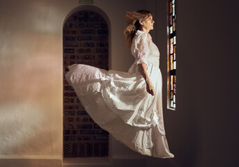 Ghost of senior woman, looking at stained glass and floating over floor of building or cathedral....