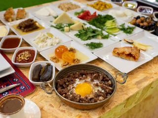 Breakfast table. Traditional Siirt breakfast dishes, top view