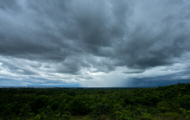 Naklejka na ściany i meble Storm clouds with the rain. Nature Environment Dark huge cloud sky black stormy cloud