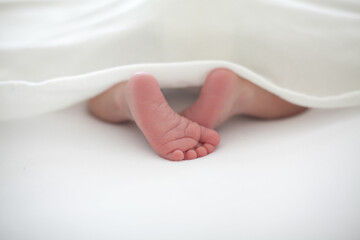 Newborn Baby Feet and Blanket