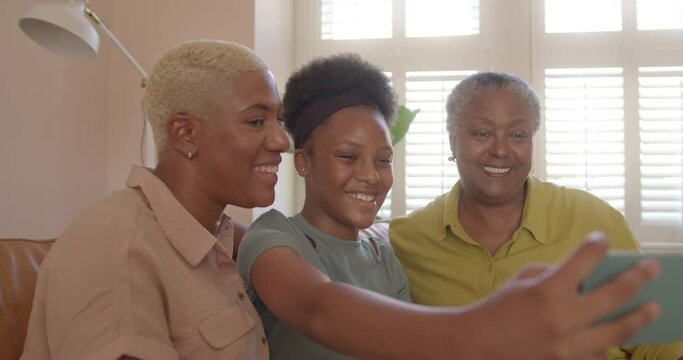 Multi-Generation Family Taking Selfie with Smart phone