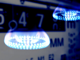 Gaszähler und Flamme von einem Gasofen