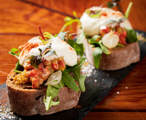Healthy bruschetta with salmon tartare