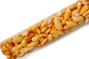 Sweetness from grains of puffed rice, shot close-up on a white background.