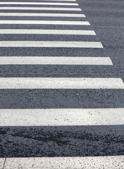 White stripes on the asphalt road.