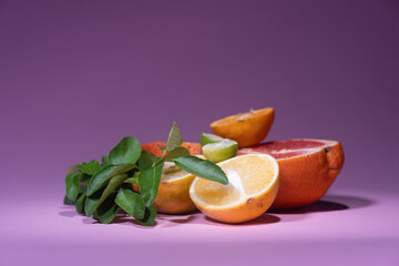 Citrus fruits cut in half background. Healthy natural food and lifestyle.