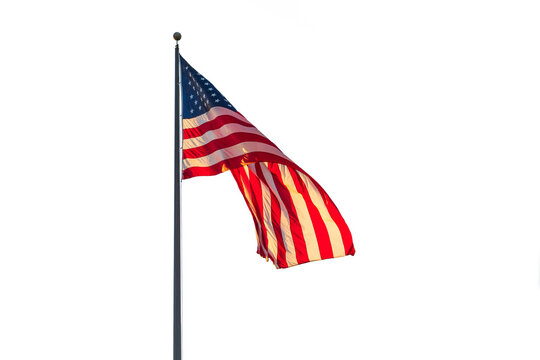 Photo of an American flag on a flying on a flagpole.