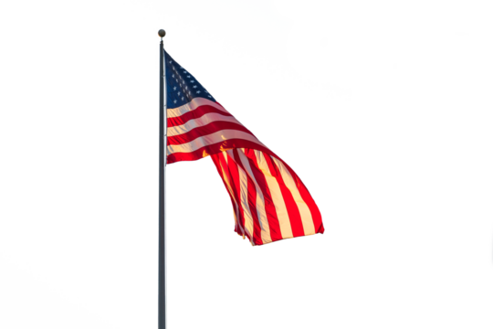 Photo of an American flag on a flying on a flagpole.