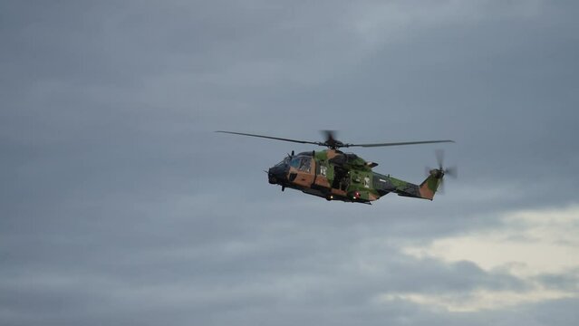 MRH90 Army Helicopter Flying Over Brisbane Riverfire Festival In Clouds, 4K Slow Motion