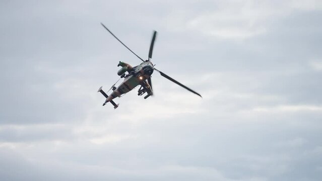 Air Force ARH Helicopter In Camo Flying In Cloud Over Brisbane Riverfire Festival, 4K Slow Motion