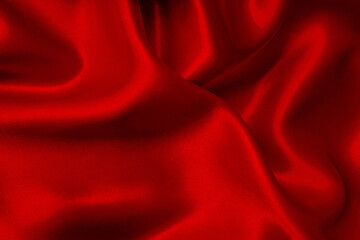 Dark red fabric texture background, detail of silk or linen pattern.