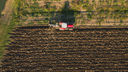 Monitcelli, Italy PC - September 2022 Tractor plowing the land in the fields