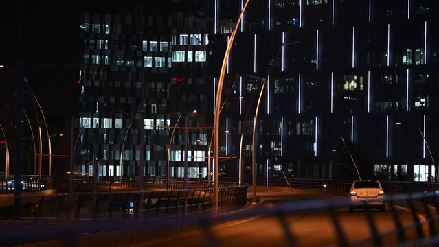 Modern office building in Bucharest during the night. 4K video corporations headquarters building next to Basarab Passage landmark in Bucharest, Romania, 2019.
