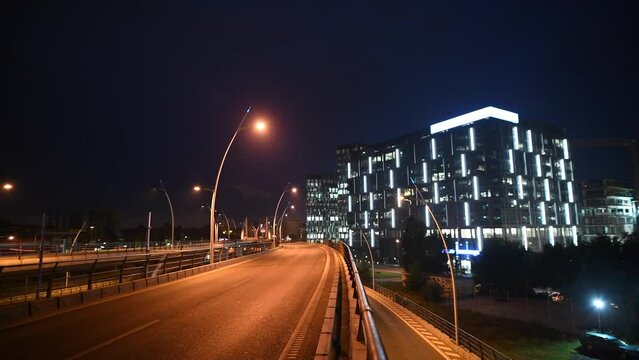 Modern office building in Bucharest during the night. 4K video corporations headquarters building next to Basarab Passage landmark in Bucharest, Romania, 2019.