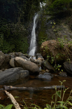 photo of a hidden waterfall, which is in Indonesia, a waterfall with a small water discharge