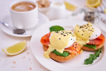 Eggs Benedict with Cream cheese and Smoked salmon on a plate