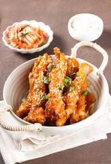 Dakbal or Maeun Dakbal is Spicy Chicken Feet Stew, Korean Food Style served with sesame seeds and Kimchi. Cakar Ayam Pedas.