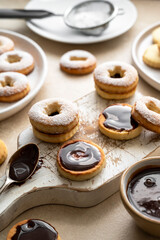 Cooking cookies process. Homemade linzer cookies with chocolate.