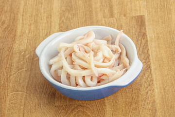 Marinated squid strips in the bowl