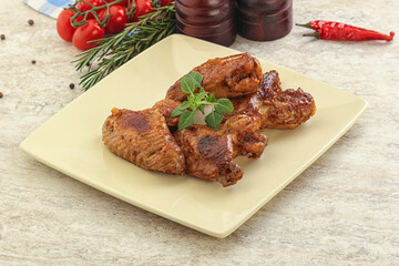 Roasted chicken wings with spicy sauce