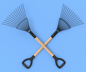 Set of garden pitchfork and rake with wooden handle for harvesting hay on blue