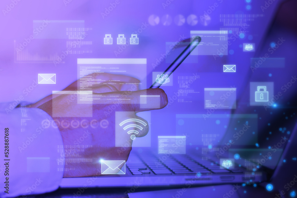 Poster Close up of businessman hands using laptop and smartphone with abstract glowing digital transformation hologram on blurry background. Double exposure.