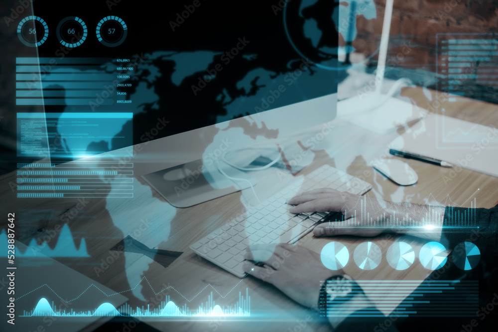 Aufkleber Close up of businessman hand using computer keyboard at desktop with abstract map and business chart hologram on blurry background. Investor, finance and financial dashboard concept. Double exposure.