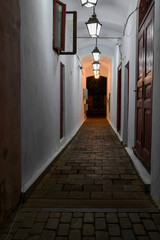 Fototapeta premium narrow passageway in the city at night