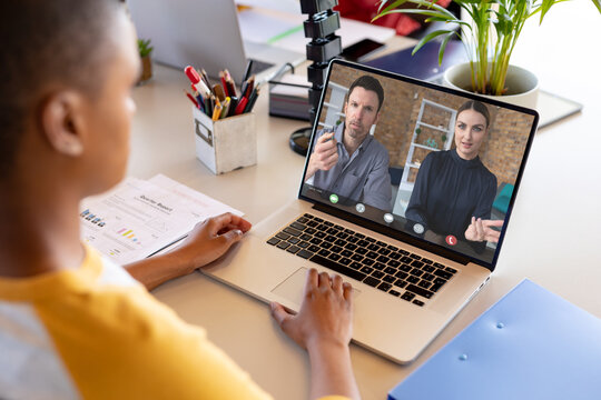 African american businesswoman having video call with colleagues