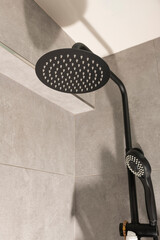 shower head with the water turned off in the bathroom. I save water. water resources.