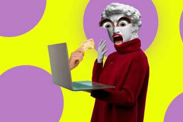 Abstract modern collage. The man with the plaster head of David in a red sweater looks at a laptop screen where does the hand with the credit card come out on a purple background