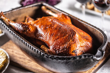 Traditionally roasted goose in an original baking dish - Close up