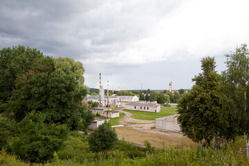 Fototapeta na wymiar View from the hill to Ruzhany with a view of the Church of the Holy Trinity. Pruzhany region. Brest region. Belarus
