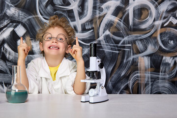 An interesting discovery was made by a small smiling scientist in glasses, studying molecules...